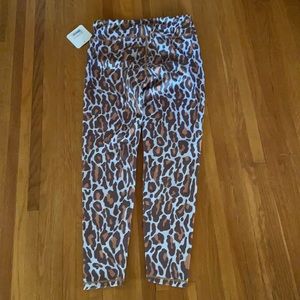 XL activewear tights. Animal print in tan colors.